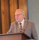 Pastor Ron Young preaching